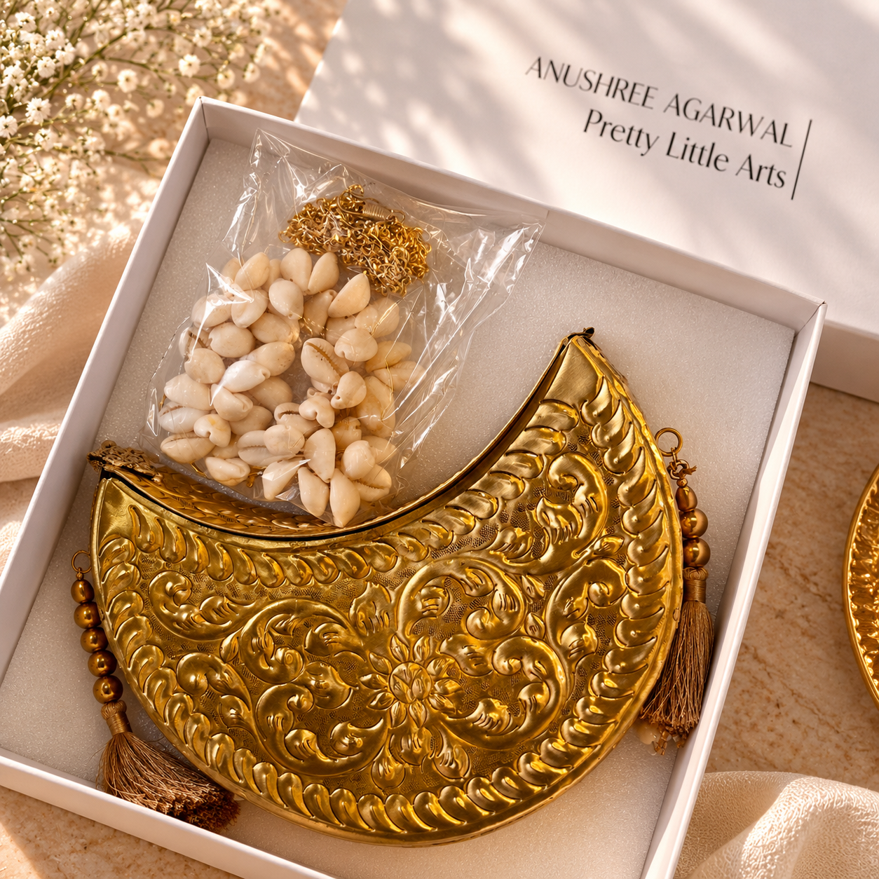 Lunar Luxe: Crescent Moon Gold Clutch